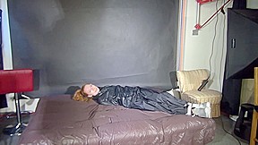 ***Ronja*** Being Overwhelmed, Tied And Gagged With Ropes And A Clothgagged From Stella Both Wearing Sexy Shiny Nylon Rain- And Downwear (Video)