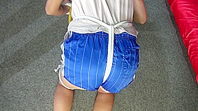 Sexy Pia Being Tied And Gagged With Ropes And A Cloth Gag On A Stool Wearing A Sexy Blue Shiny Nylon Shorts And A Tshirt (Video)