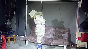 Sexy Sandra Being Tied And Gagged And Hooded With Ropes And A Ballgag Overhead Wearing Sexy Rainwear And Rubber Boots (Video)