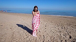 Bikini Fanatic enjoys herself on the beach!