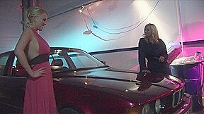 Gorgeous blonde MILFs have sex on car