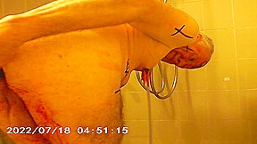 satan slave gets an enema treatment from satan