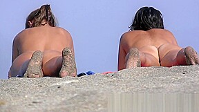 She like to be nude at the nudist beach