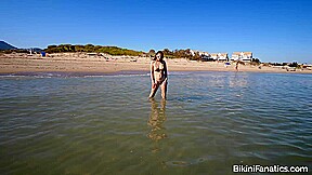 Sheer and sexy on a public beach
