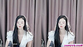 A blowjob is administered from behind and thrust into the crotch of a young woman with lovely genitalia.