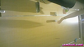 An Asian prostitute dressed in all black is caught on a