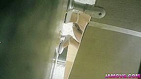 asian girl pissing in toilet