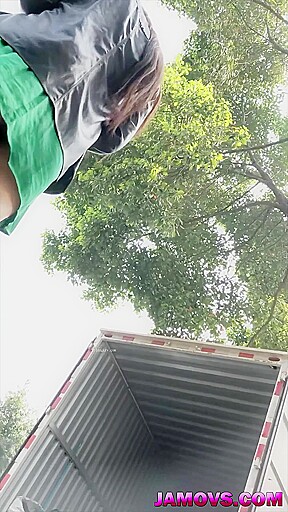 MILF from Asia is fucked by a white guy in front of the camera.