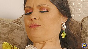 A mature, attractive British woman named Aurora attends a pre-arranged meeting with a much younger man.