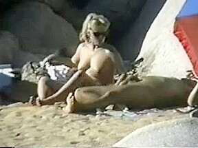 Couple has Fun at the Beach by snahbrandy