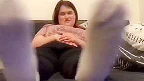 Hot cheerleader relaxes in bed and talks about her white socks worn 1 day